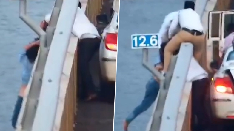 Young Woman Suicide Attempt: பாலத்தில் இருந்து குதித்த இளம்பெண்; தலை முடியை பிடித்து காப்பாற்றிய ஓட்டுநர்.. வீடியோ வைரல்..!